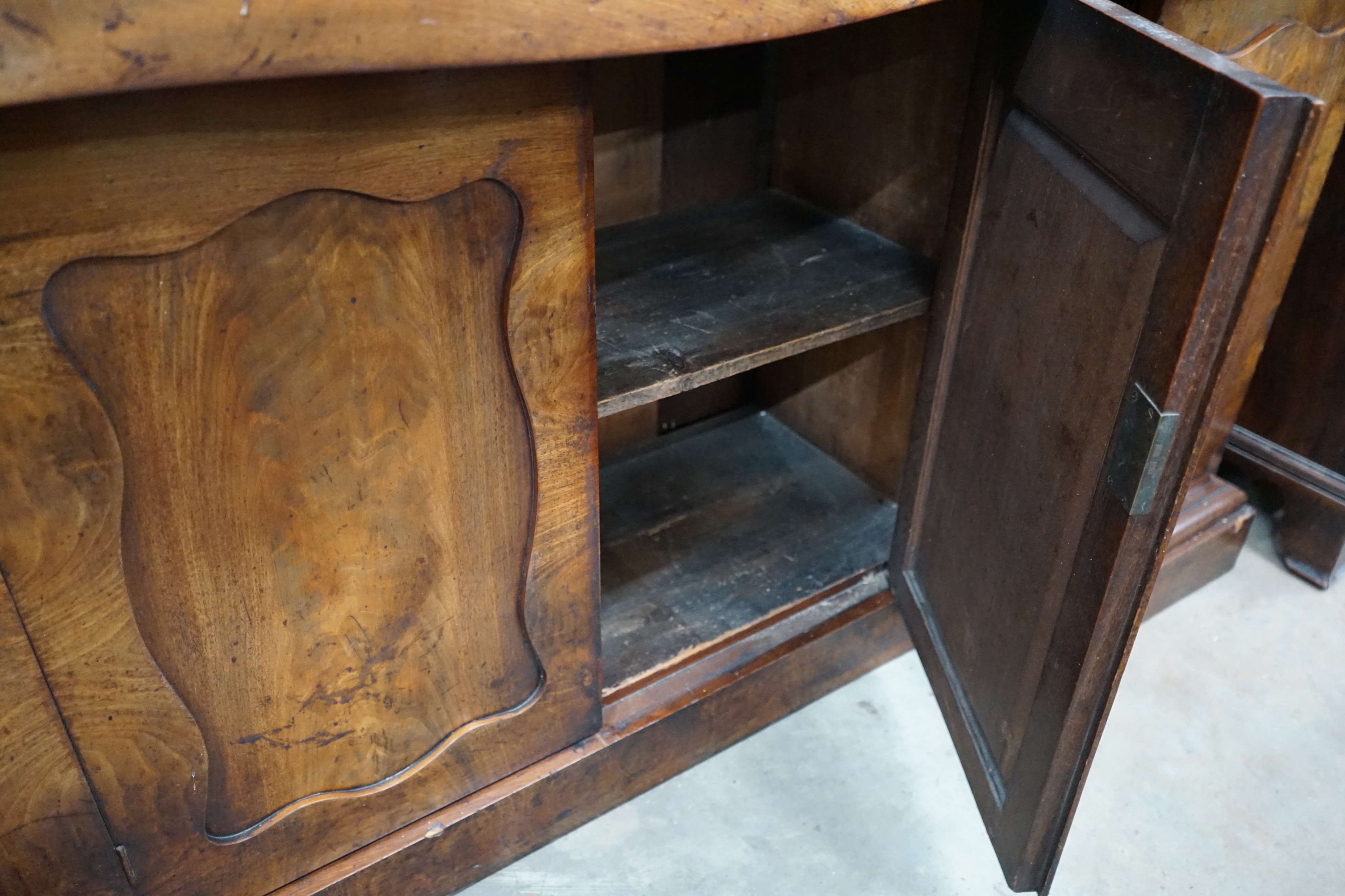 A Victorian mahogany serpentine sideboard, width 182cm depth 54cm height 93cm